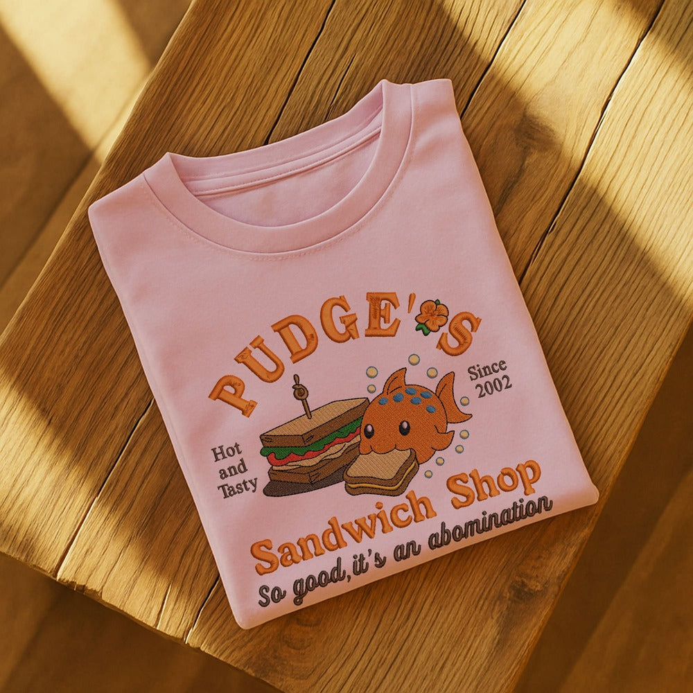 Pudge’s Sandwich Shop, Pudge Controls The Weather Fish Lilo & Stitch Embroidered Shirt
