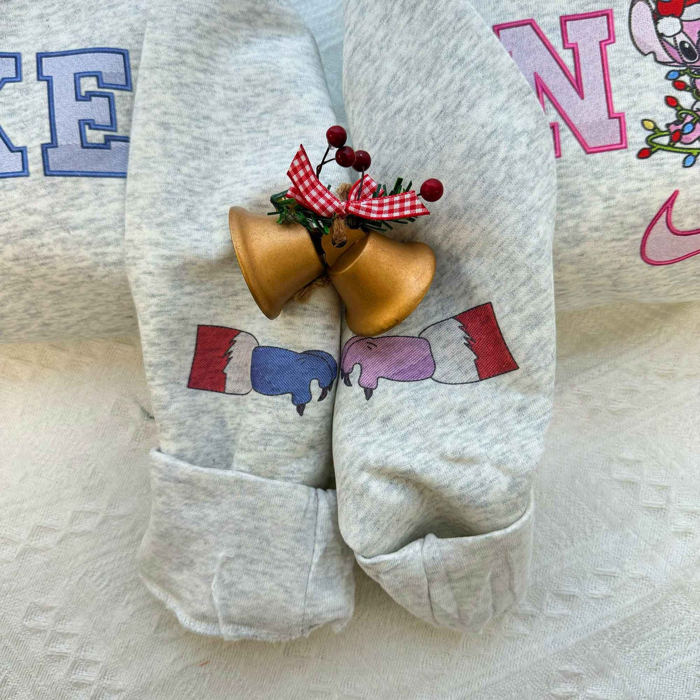 Stitch And Angel Christmas Faux-Embroidered Sweatshirt